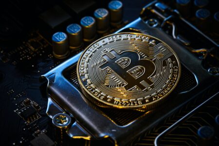 A bitcoin on a  computer hardware