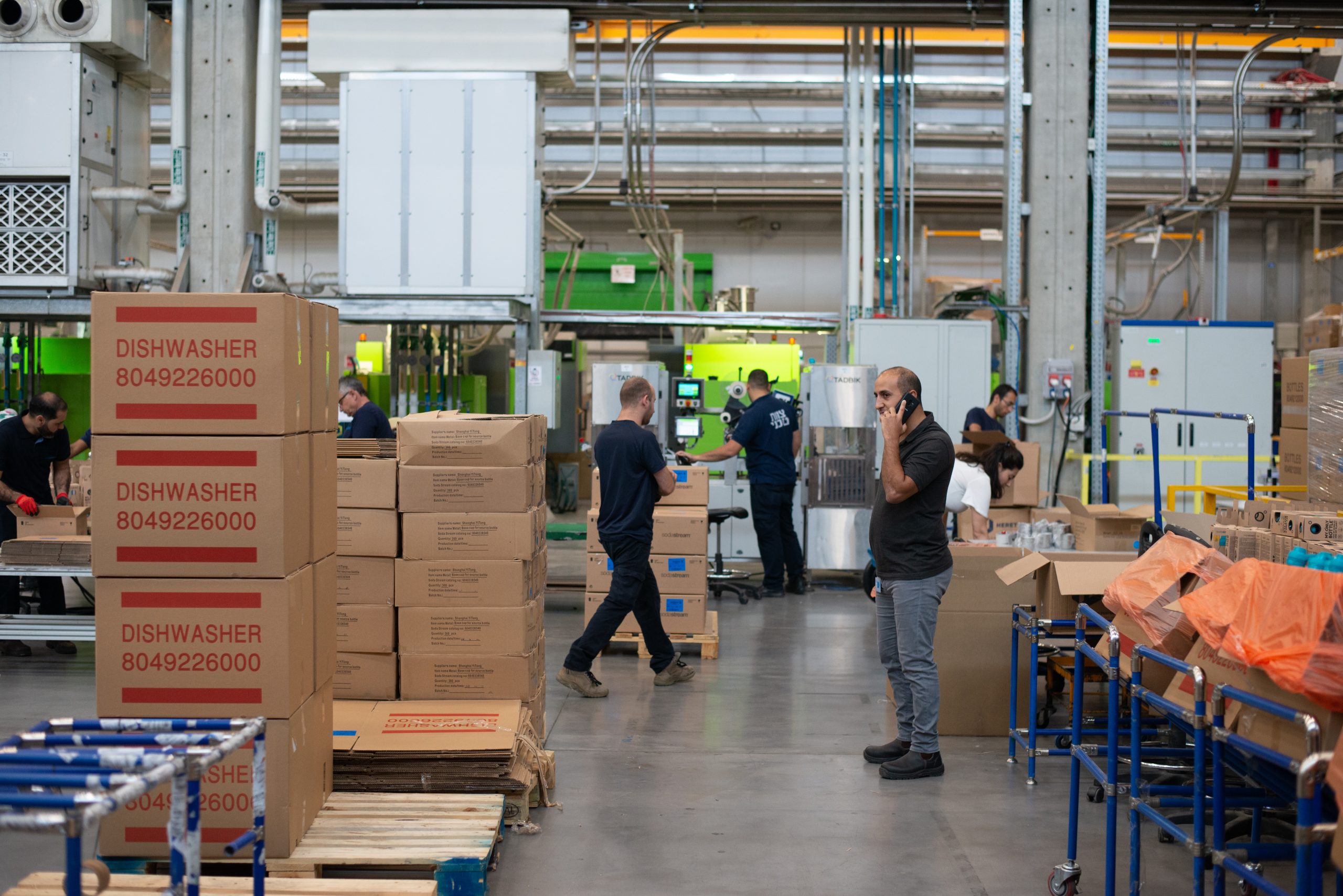 people working in a factory round the clock
