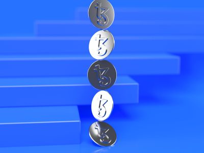 a stack of tezo coins